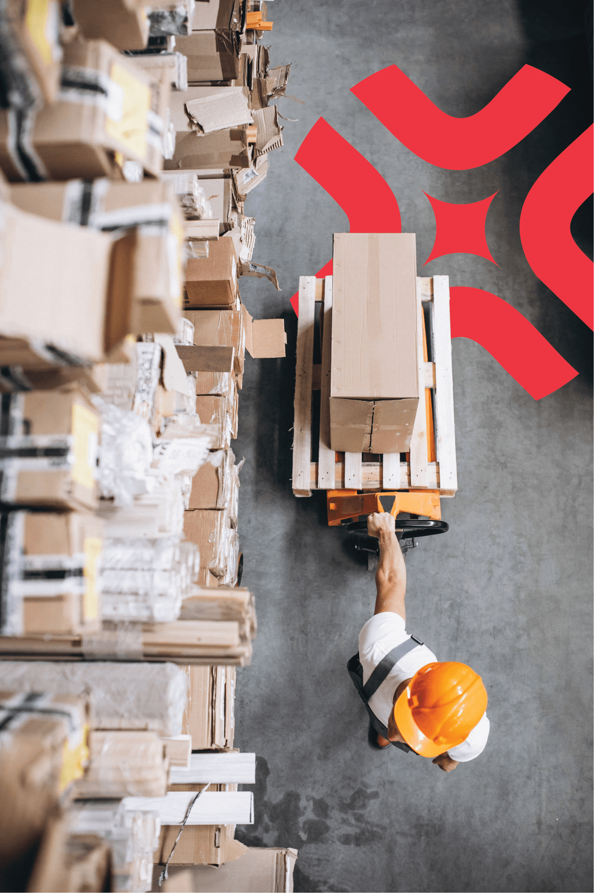 Warehouse worker moving a pallet with a jack